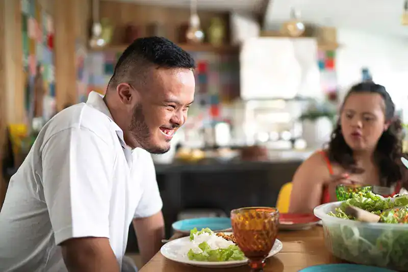 Empowering Weight Loss: A Comprehensive Guide for Individuals with Disabilities 2 Image of a disabled man and balance around nutrition to aid weight loss Cambridge