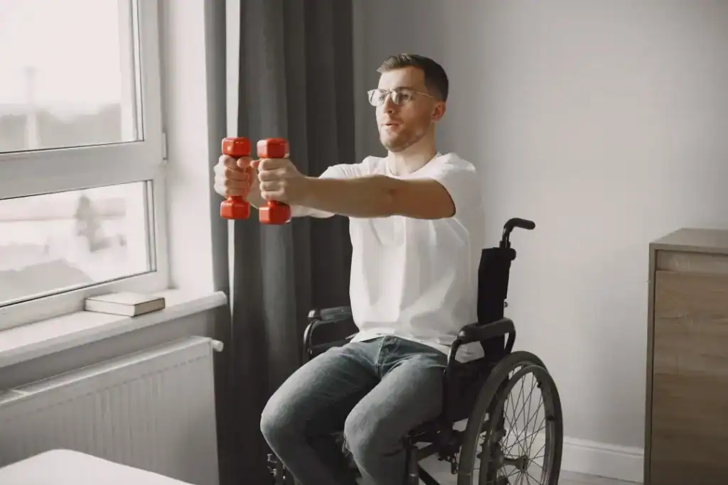 Empowering Weight Loss: A Comprehensive Guide for Individuals with Disabilities 1 Image of man doing exercise in his wheelchair to aid weight loss Cambridge