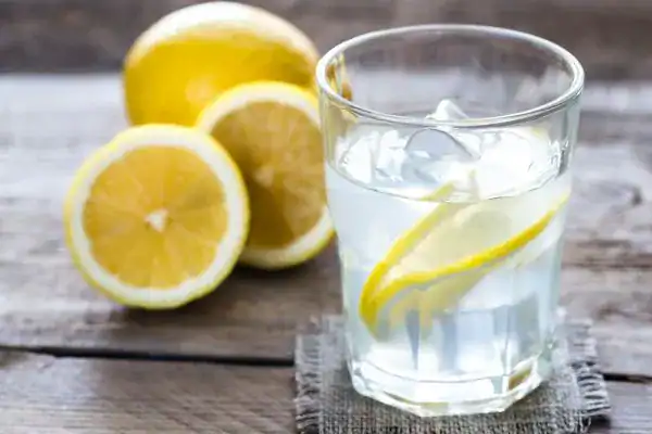 Hydration: The Secret Ingredient for a Toned Stomach and Enhanced Fitness 2 Image of lemon water to aid hydration Cambridge